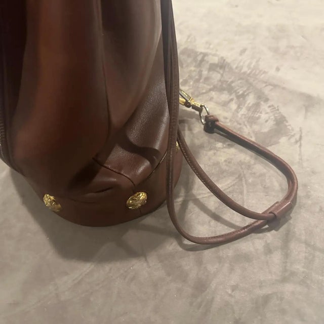 This is an exceptionally iconic vintage Salvatore Ferragamo backpack from the 1980s, crafted in a rich, supple cognac...