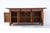 This 19th century sideboard was handmade from sturdy elm. Features a 3 door opening and 2 inner long shelves for simple,...