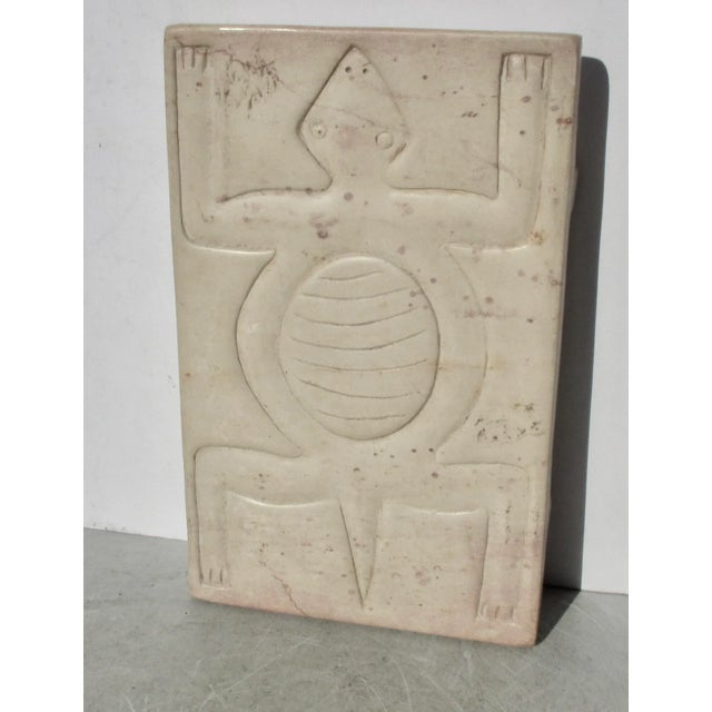 African, Kenyan soapstone carved tray in the form of a traditional low table. The design features the body of a large...
