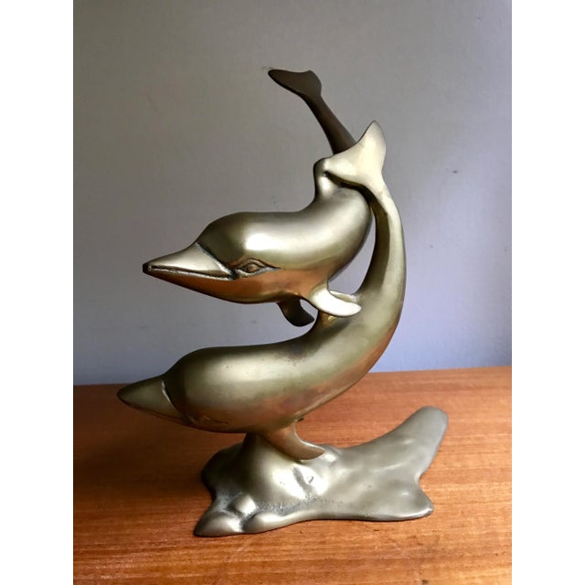 For a vintage accent with some Mid-Century flair, try on this coupled brass dolphins statue. Perfect for your desk or...