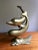 For a vintage accent with some Mid-Century flair, try on this coupled brass dolphins statue. Perfect for your desk or...