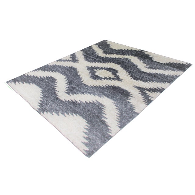 A beautiful handmade Bamboo rug. The geometric design woven in by Aara Rug hands. This rug is made of 75% bamboo silk and...