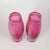 Pair of Chribska glass vases. Elegant set of two hand-blown pink art glass vases with baluster form, clear base and signed...