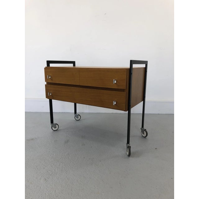 Multi-functional teak cabinet. It has two open drawers and one open shelf. The piece of furniture in original condition,...