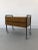 Multi-functional teak cabinet. It has two open drawers and one open shelf. The piece of furniture in original condition,...