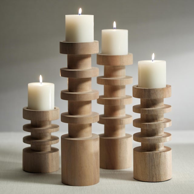 This wooden pillar candle holder is crafted from mango wood and is a perfect accent for any space. This candle holder...