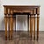 This set of three nesting tables is from the Vercelli Collection by Drexel. Features four-way book-matched walnut veneer...