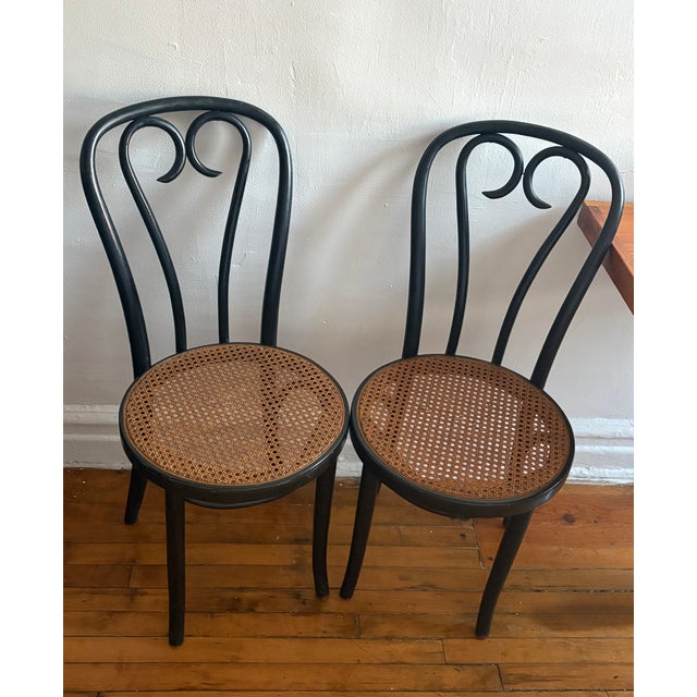 Beautiful matched pair of antique bentwood chairs in the Thonet No. 18 style — the classic cafe chair that's been in...