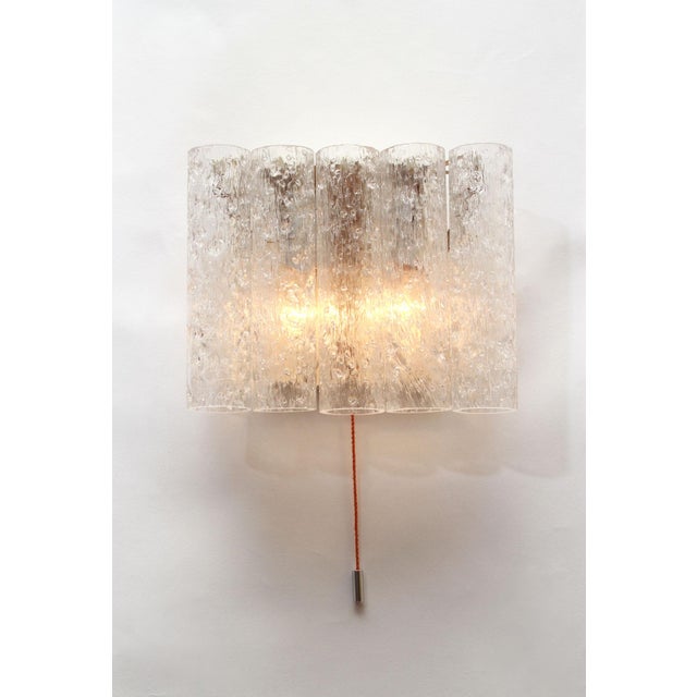 Pair of wall lamps from the 1960s. Manufacturer: Doria Leuchten, Germany. Each lamp has a cord switch. For two E14 bulbs....