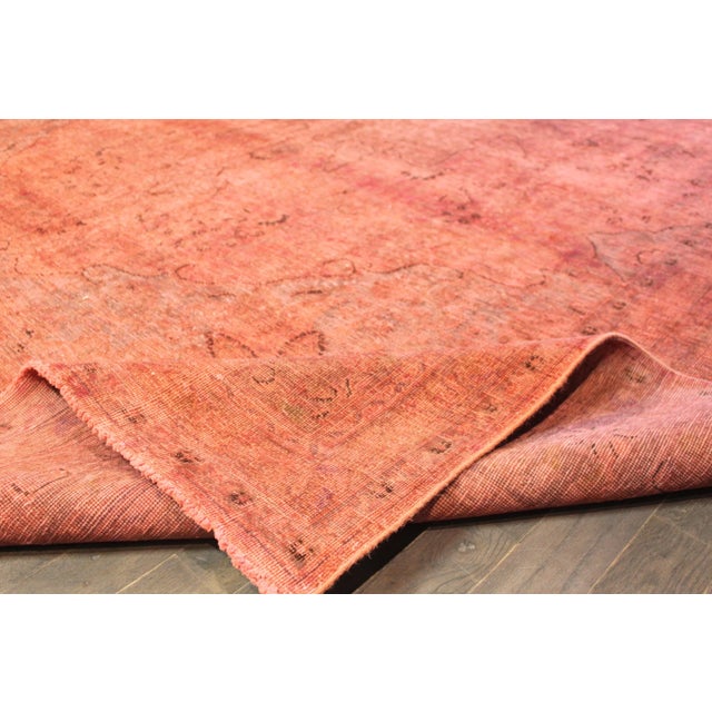 This beautiful vintage distressed over dyed hand-knotted with a medallion floral design. will make your floor look...