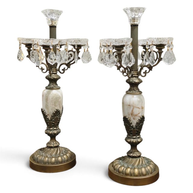 An exquisite pair of vintage 1980s five-arm candelabras featuring genuine natural onyx, ornate antiqued brass-tone...