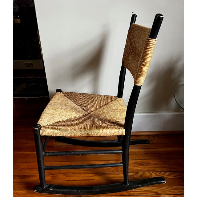 Stylish Italian modern rocking chair features the rush seat design of Otto Gerdau in the style of the Iconic Gio Ponti...