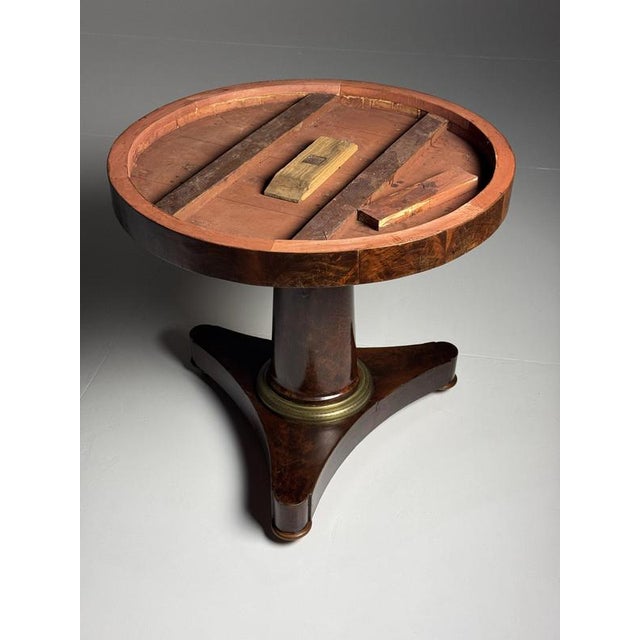 French Center Table, mid-/late 19th century. Mahogany veneer. with a hardstone top. In good condition. Sturdy and solid....