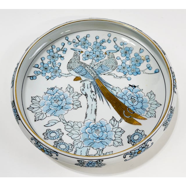 Vintage hand-painted Imari Porcelain shallow catchall/dish/bowl. This beautiful gold rimmed piece features two blue...