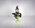 One of ten in a collection of sculptural postmodern pottery teapots, each with a feminist witch design. They come from a...