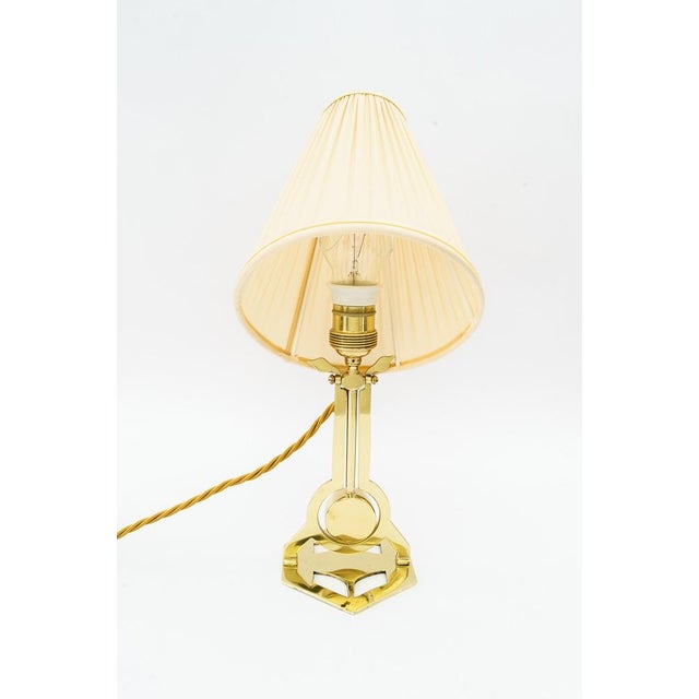 Brass polishged and stove enameled. The fabric shade is replaced ( new). European Plug (up to 250V).The wiring of this...