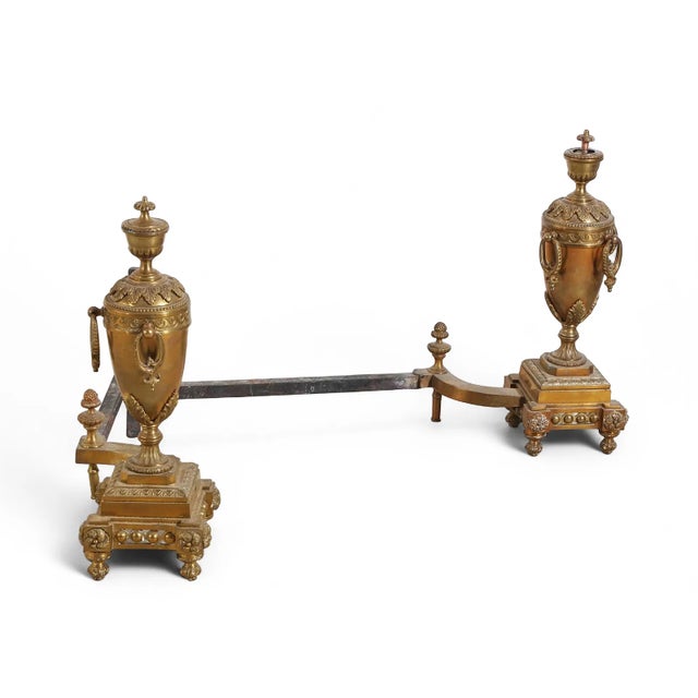 This listing is for a pair of phenomenal Louis XVI style gilt bronze fireplace chenets/andirons. These urn form chenets...