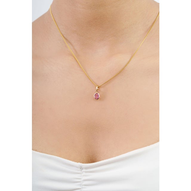14K Yellow Gold Pink Sapphire Pendant – Oval Gemstone Bezel Set Charm Add a delicate pop of color to your jewelry...