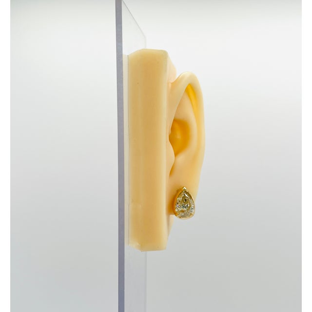 Beautiful 7.55 ct. white diamond pear shape earrings. Handmade in 18k yellow gold with push back setting.