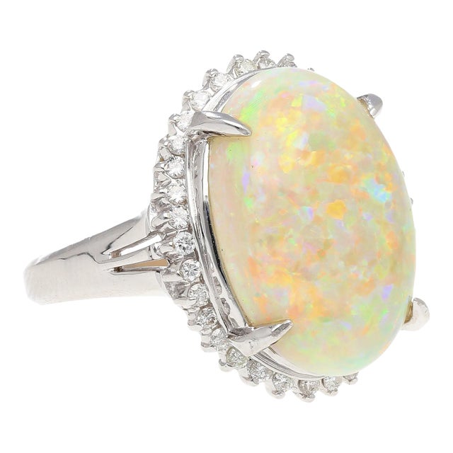 7.86 Carat Natural White Opal and Diamond Halo Platinum Ring For Sale