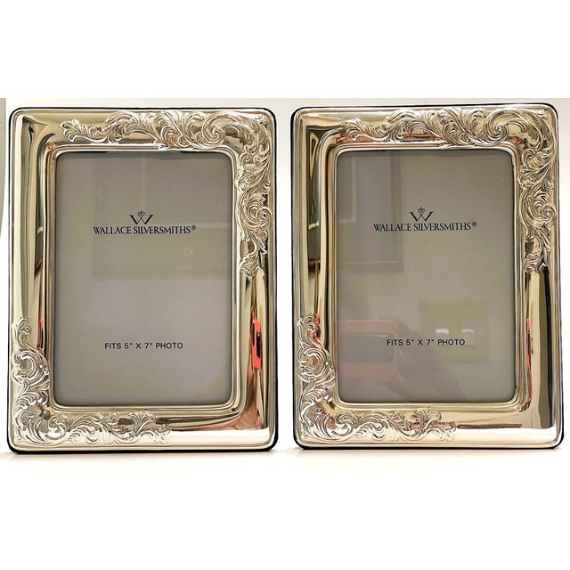 These are matching vintage decorative Wallace silverplate picture frames backed by dark or navy blue velvet. They are...
