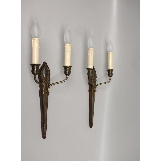 A pair of rare, elegant wall lights with floral elements - rose petals - from the Art Nouveau period. The lights are of...