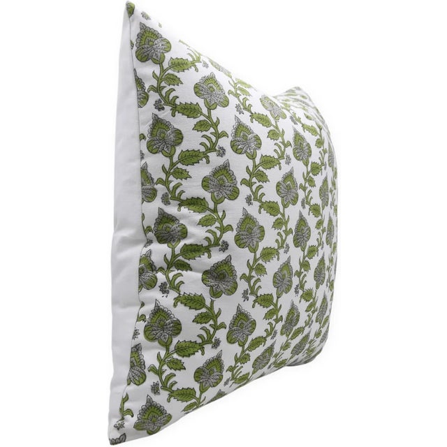 Bring warmth and artistry into your space with this block print handmade cushion cover. Crafted from thick white cotton,...