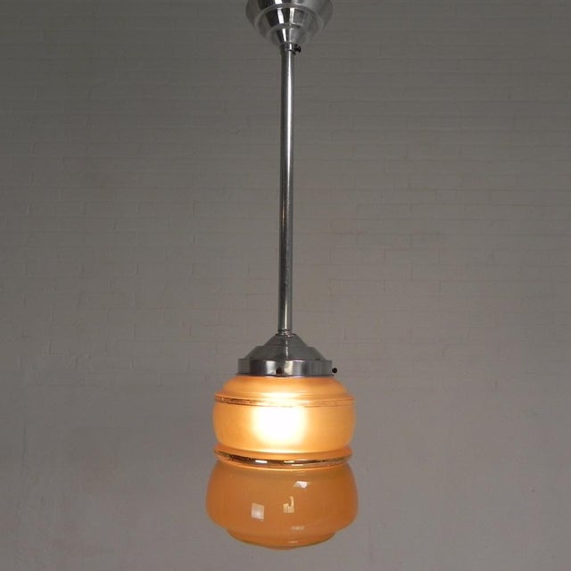 Height: 65 cm. ø: 16 cm. height of glass shade: 16 cm. the lamp is fitted with new wiring and a large socket (e27)....