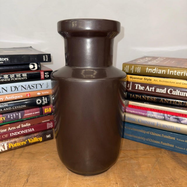 "About This Piece About This Piece This vase is the embodiment of understated refinement, balancing strength and elegance...