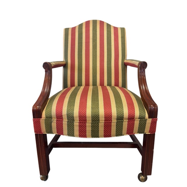 A handsome Regency-inspired mahogany library armchair by Hekman Furniture, featuring elegant traditional styling and solid...