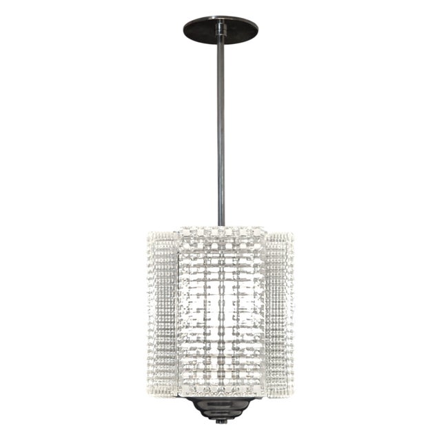 A striking four panel rectangular glass and nickeled bronze French Modernist / Mid century lantern, composed of four...