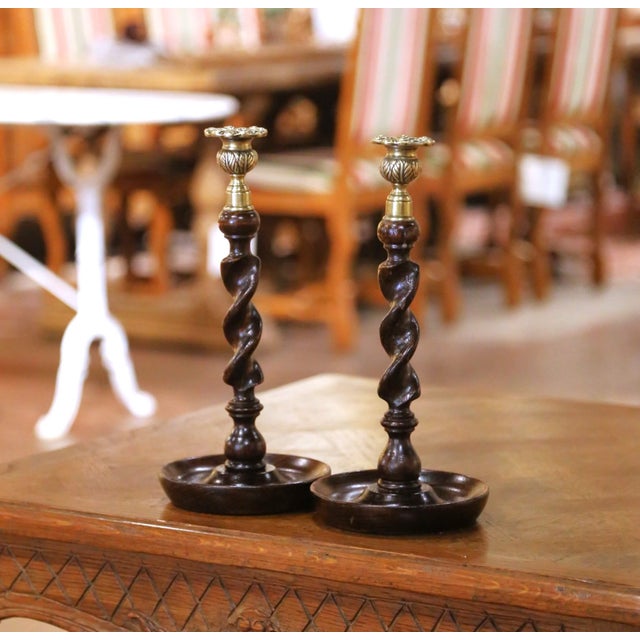 Decorate a mantel, dining table, buffet, or library shelf with this elegant pair of antique English candlesticks. Crafted...