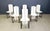 Set of 6 post modern white lacquered wooden dining chairs with grey metal legs. Fantastic design, sadly we dont know the...