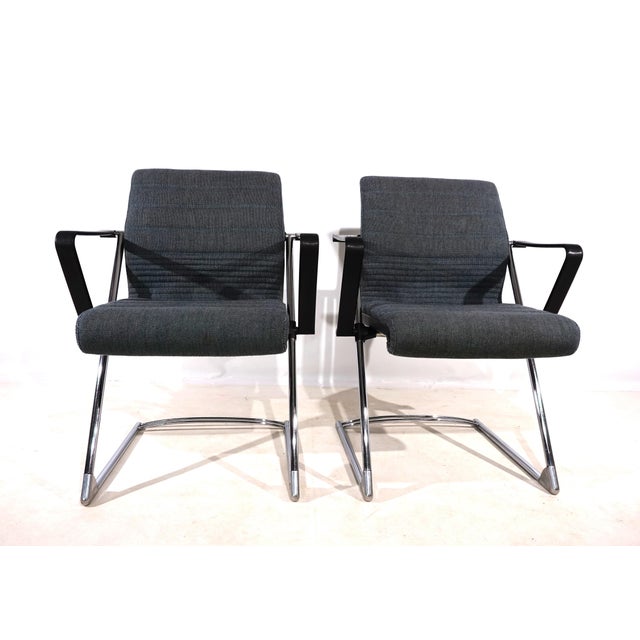 The set of 2 Drabert Z chairs with a gray/blue fabric cover and black plastic shells in good condition. The covers and the...