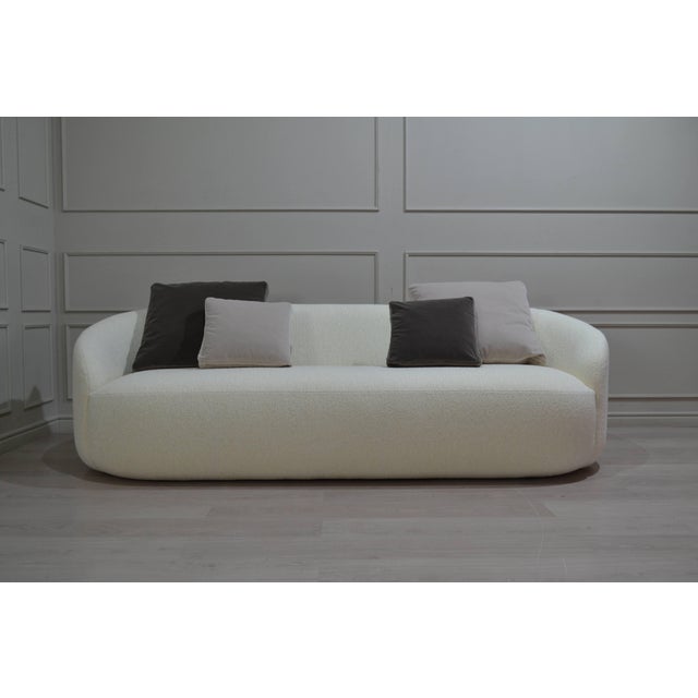 The rounded, curved shape, is crafted into the unique and original design of this well-proportioned and visually...