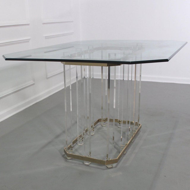 Charles Hollis Jones lucite and brass dining table with beveled glass top in good vintage condition. Showing some signs of...