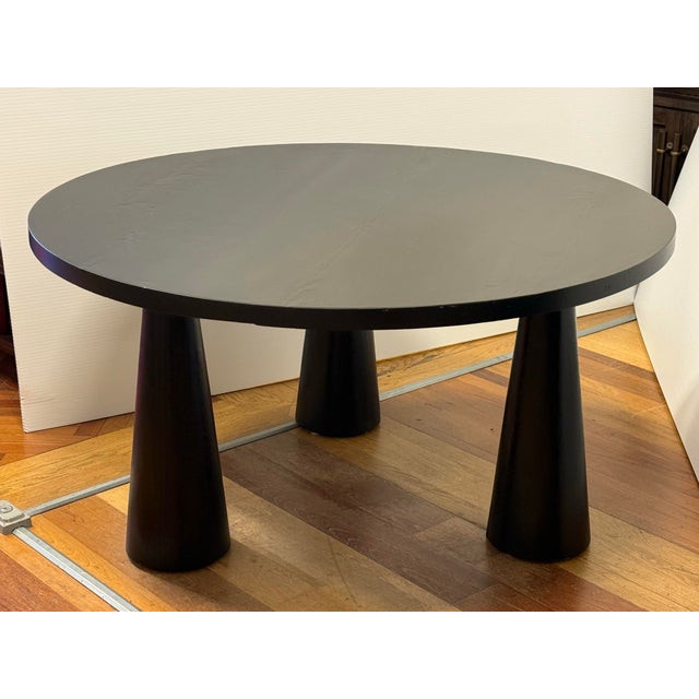 Design Plus Gallery presents the Noir David Dining Table by CFC. Designed with three conical legs inspired by...