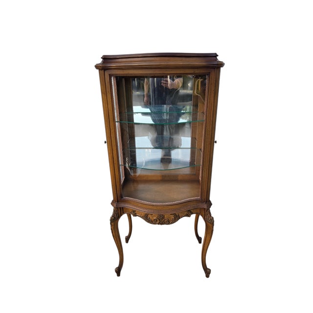 Beautiful bow glass display cabinet in excellent condition. Minor ware. Please see photos as they are considered part of...