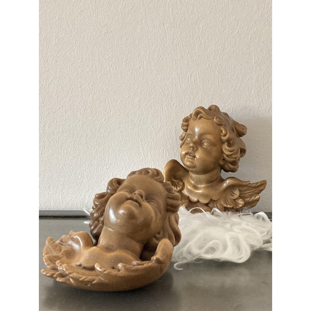 Each angel has a small hanging loop.