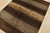 A contemporary Gabbeh rug hand-knotted with fine wool on a cotton foundation. This rug features large stripes in brown and...