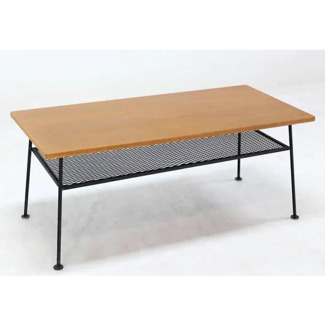 Very nice mid-century modern coffee table attributed to Mattieu Mategot. Made in the 1960s.