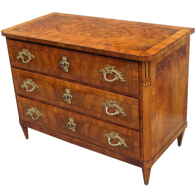A fine Louis XVI period chest with three drawers from Dresden, Germany circa 1780. The top, front and sides feature walnut...