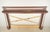 Colonial Revival painted wood mantle with architectural detailing including pilasters with acanthus capitals. Painted in...