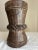 This primitive vintage hand-carved wooden mortar from India was traditionally used for grinding spices. Its aged surface...