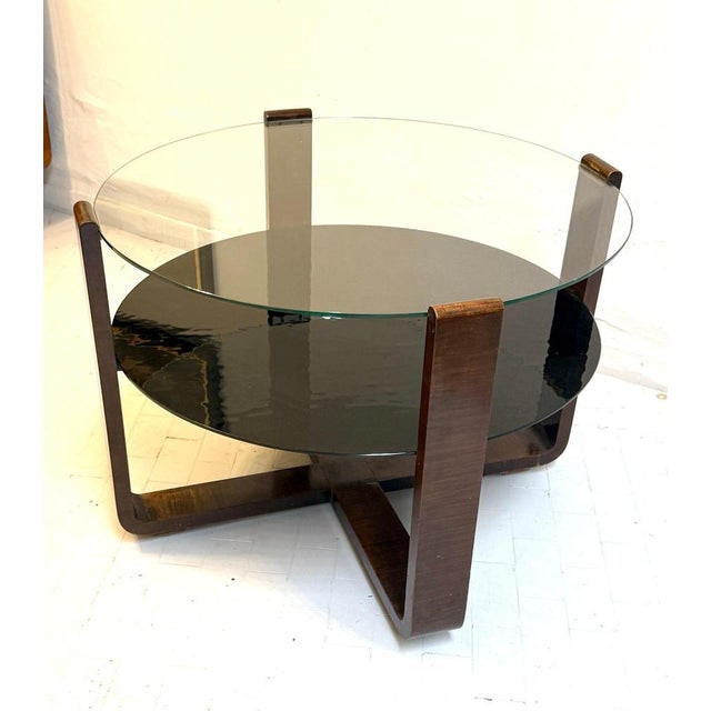 A fine Art Deco walnut Table centered with dark grey glass and clear glass top. Very good original condition.