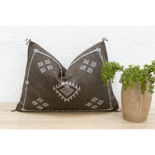 Introduce a touch of timeless Berber artistry to your space with our handcrafted lumbar / rectangular Moroccan cactus silk...