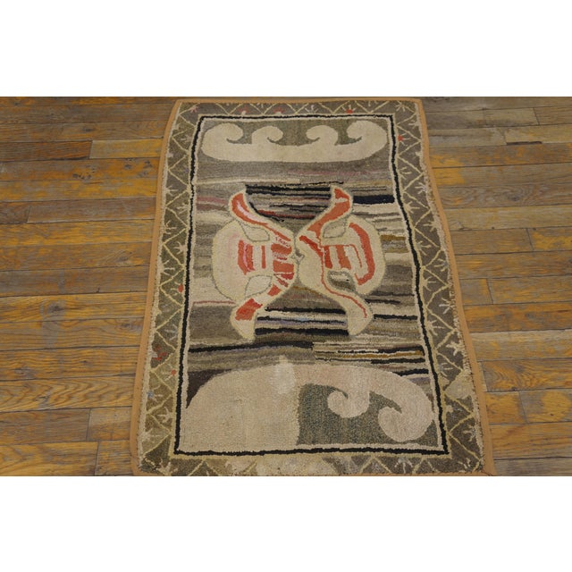 Antique American Hooked rug, size: 2'0" x 2'10". American Hooked Rugs Contemporary American Hooked carpet utilizing strips...