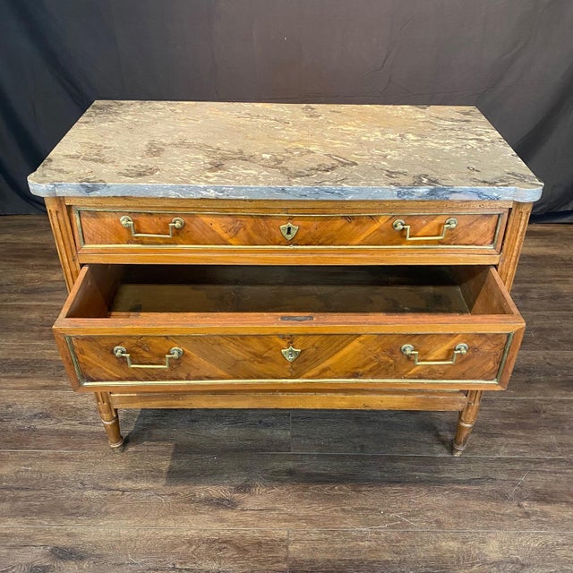 Elegant 19th century French walnut commode secrétaire, chest of drawers or dresser combining handsome storage with a...