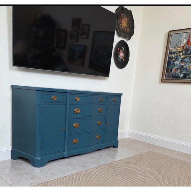 Beautiful blue credenza with 6 large drawers and 2 small drawers, offering plenty of storage. Dimensions: * Width: 62...