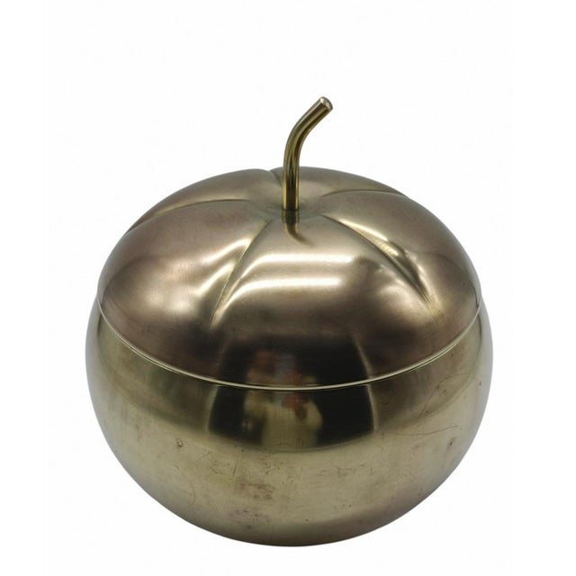 Gorgeous and iconic 1970s design object, featuring an elegant pumpkin shape. Crafted entirely of brass, this piece is...